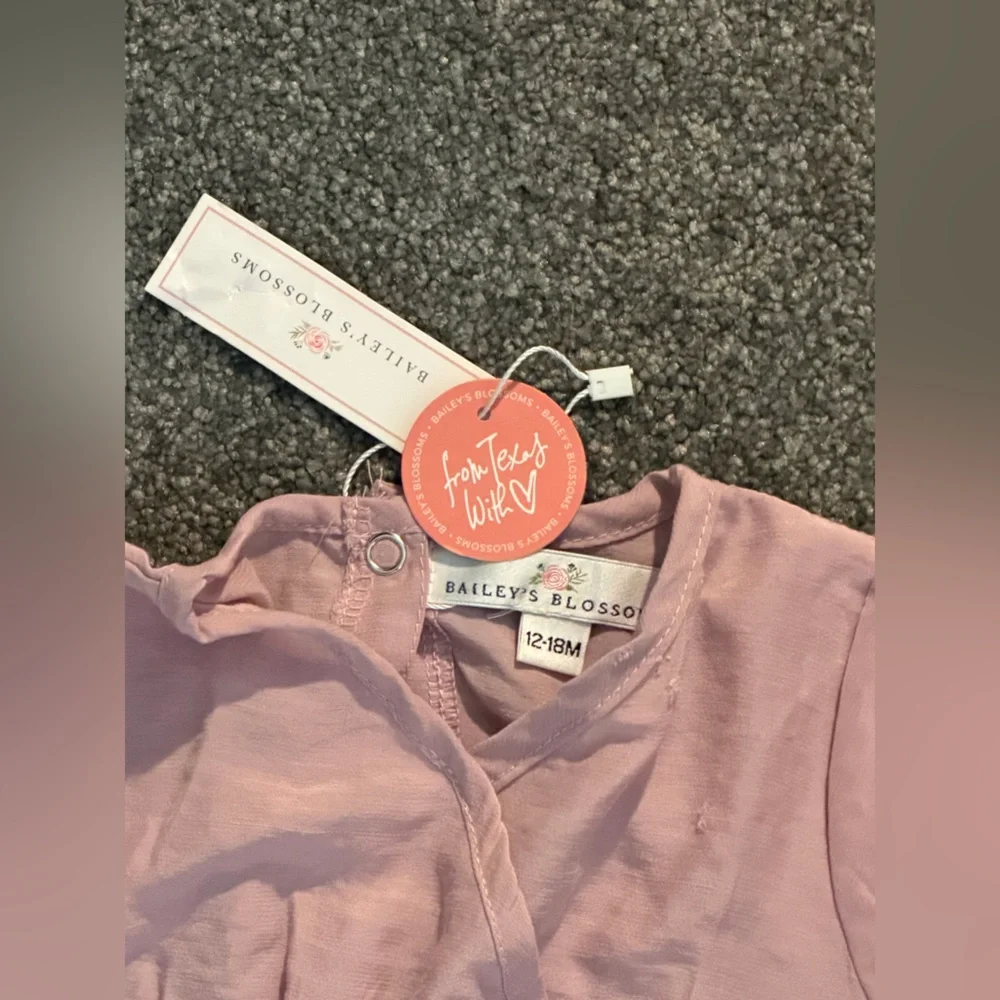Bailey’s Blossoms Mauve Pink Bell Sleeve Baby Romper – Size 12–18M NWT